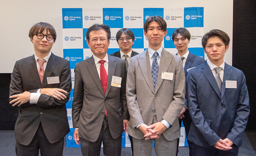 Award-winning student members with Trustee Arai