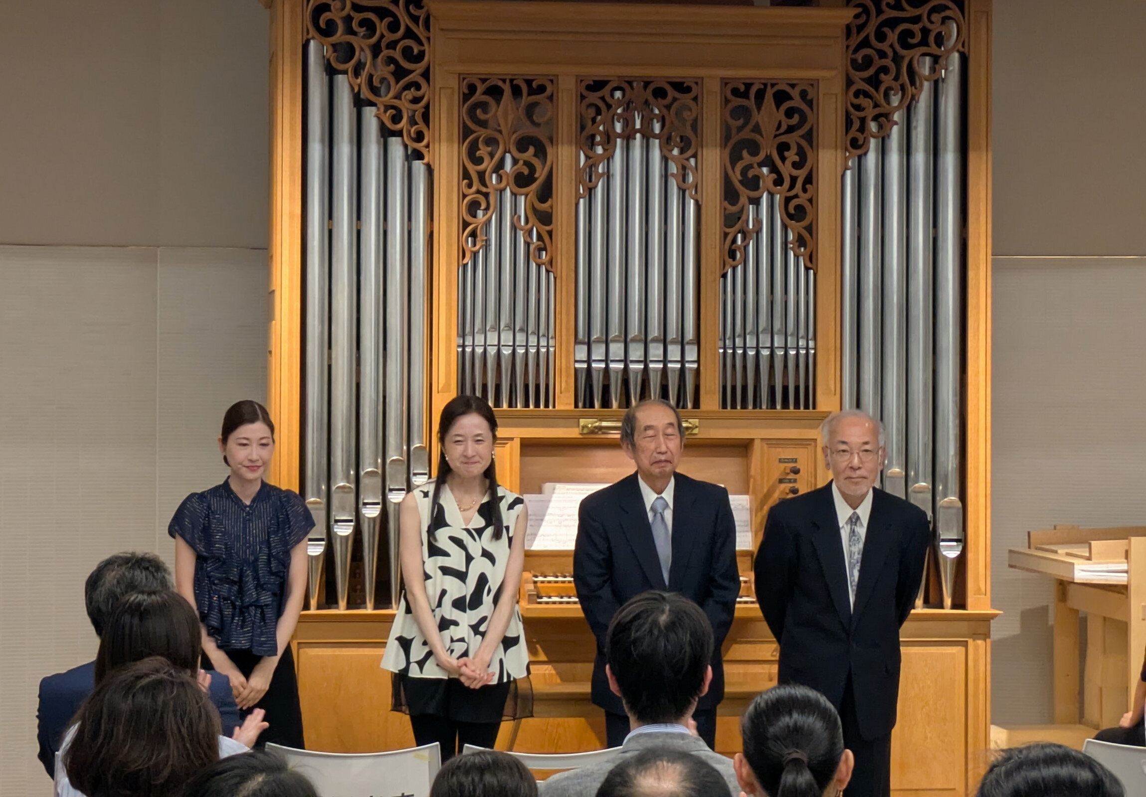 From left in the photo: Ms. Mayu Harada, Ms. Megumi Tokuoka, Mr. Tetsuo Kusakari, and Mr. Tetsuya Kan.